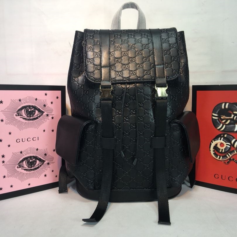 G*u*i backpacks